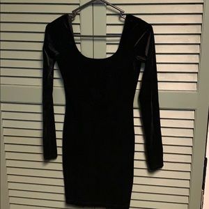 Black velvet long sleeved dress